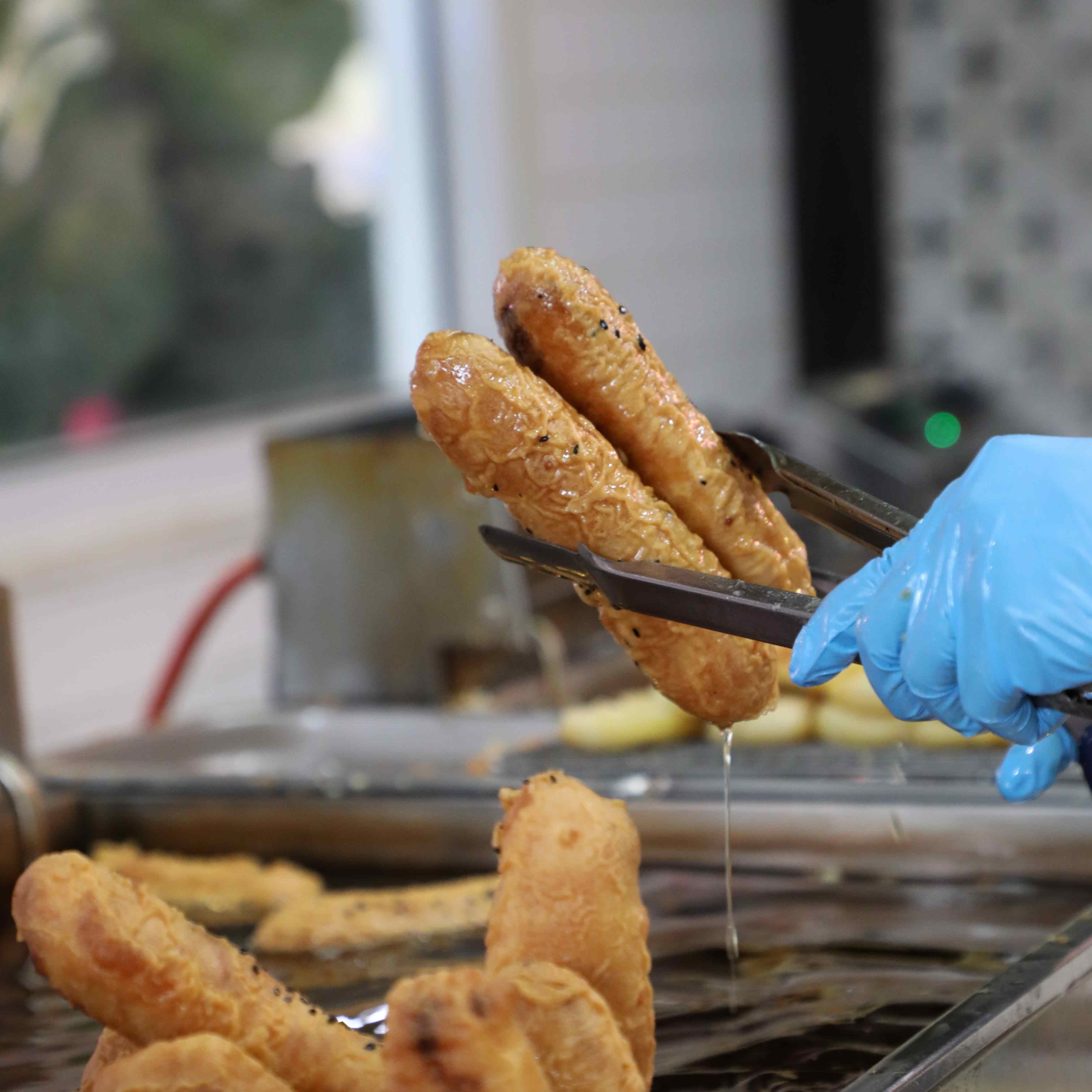 Banana fritters being cooked at Ganh Chuoi Chien